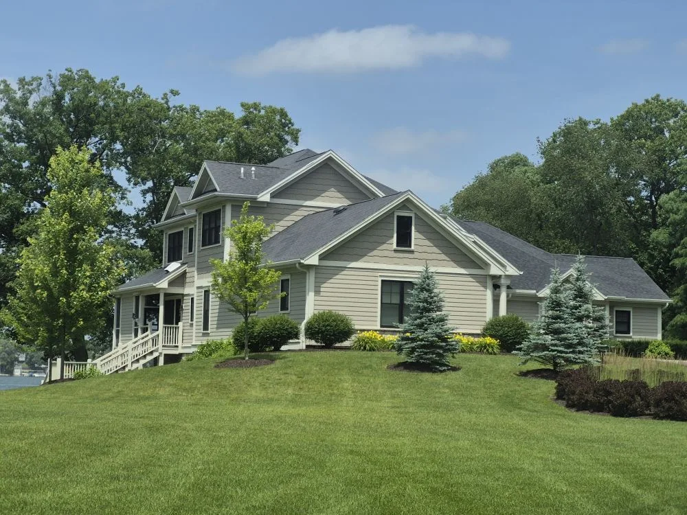 Porch railings and stairs on a two-story home